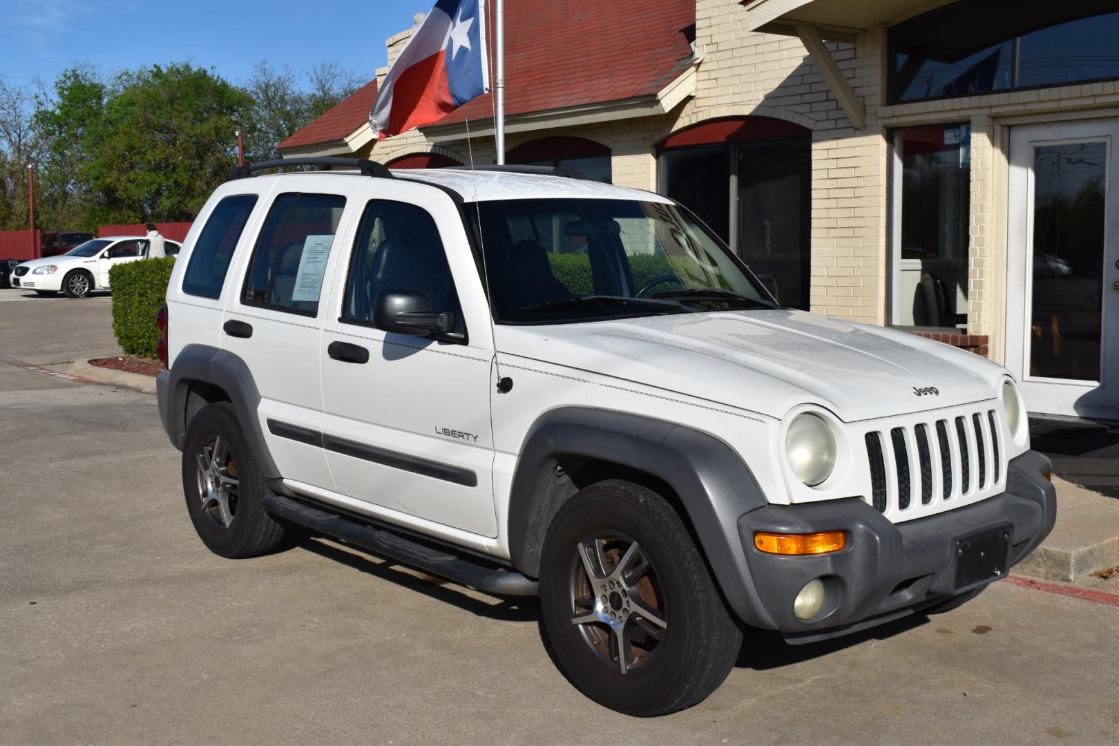 2004 White /Tan Jeep Liberty (1J4GL48K34W) , located at 5925 E. BELKNAP ST., HALTOM CITY, TX, 76117, (817) 834-4222, 32.803799, -97.259003 - Buying a 2004 Jeep Liberty can offer several benefits, depending on your needs and preferences: Off-road Capability: The Jeep Liberty is known for its off-road prowess, with features such as available four-wheel drive and a rugged design that can handle various terrains. If you enjoy outdoor activi - Photo#5
